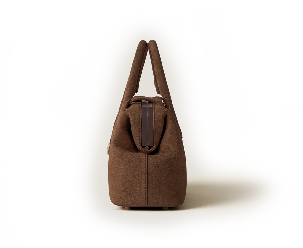Side view of the Schell Doctor Bag Chocolate Small in suede leather